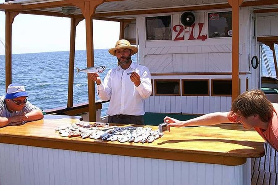 Agadir: Boat Trip with Fishing, Swimming, and BBQ Lunch - Fishing Stop: What It Feels Like When the Crew Helps