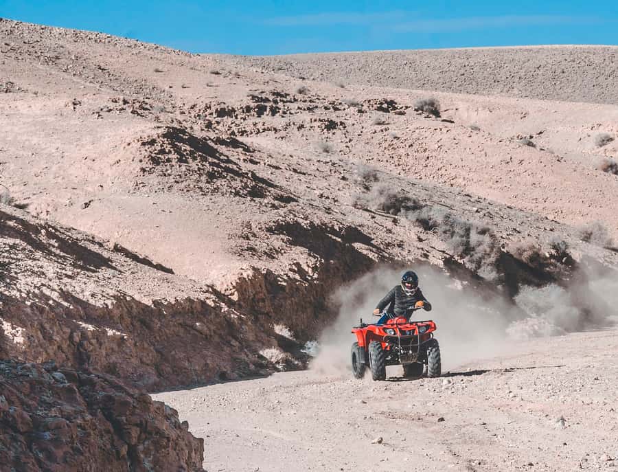 Agafay Desert: Quad Bike and Camel Ride Adventure Tour - Camel Ride in Agafay: Pace, Pictures, and Village Reality