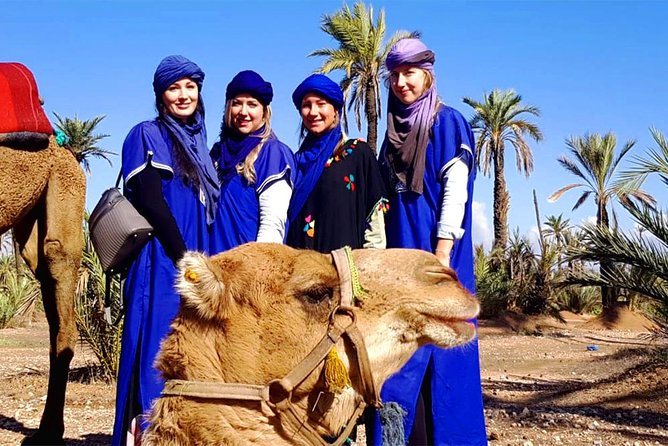 Camel Ride, Quad Bike Adventure and Spa Treatment in Marrakech - Camel Ride in the Palmeraie Oasis: Trained Camels, Sahrawian-Style Dressing, and Tip Reality