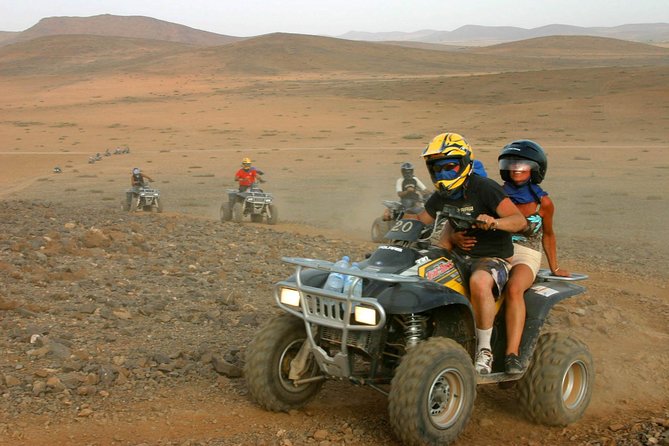 Desert D'Agafay Package - Quad, Dromedary and Dinner Show - Moroccan Dinner Show: Tajine, Belly Dance, Gnawa Music, and Fire Performers