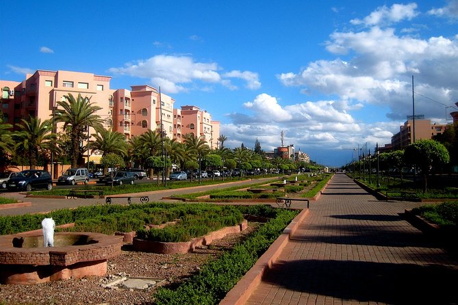 Exploring Marrakesh in half-day sightseeing tour - Stop 2: Koutoubia Mosque, Free, Impressive, and Quick