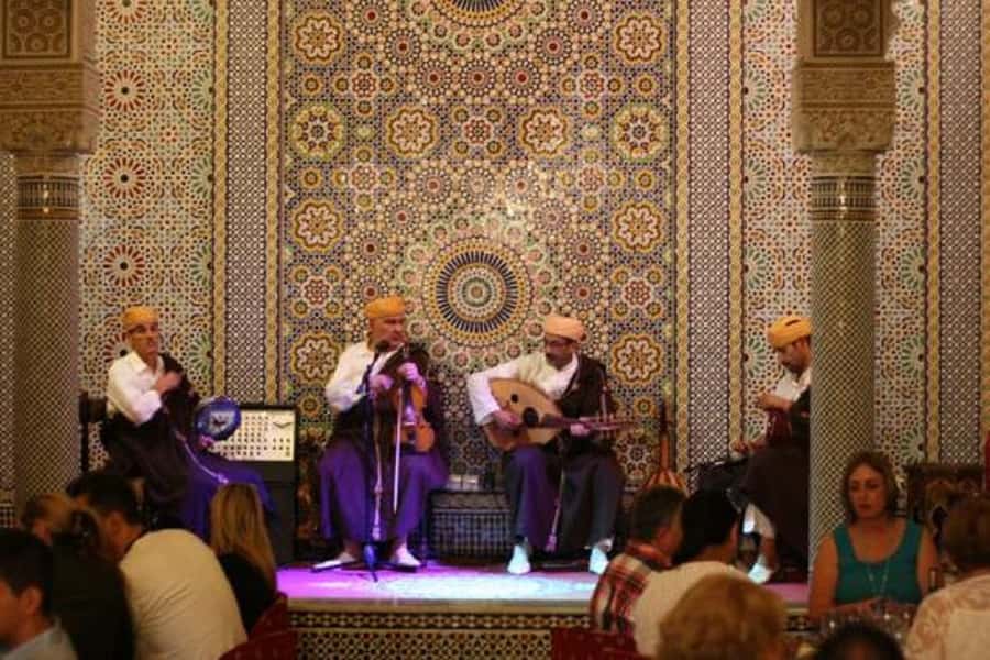 Fes : Unforgettable Dinner Show Experience with hotel pickup - Dinner at the center: seven salads, bread, olives, tajines, couscous