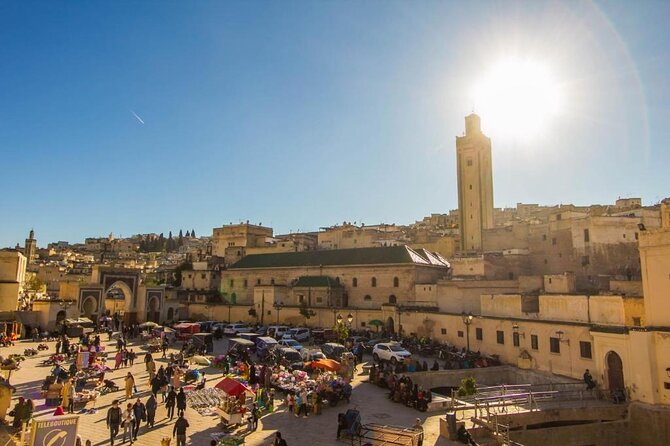 Fez Highlights Half-Day Tour: Unveiling the Best of the Medina - Your First Big Landmark: Bab Boujloud and the Mellah Story