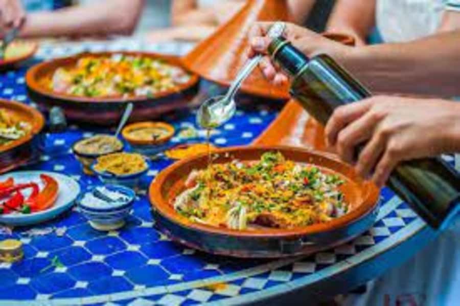 Flavors of Fez: Market visit, and a hands-on cooking class. - A home kitchen setup, with mint tea and real comfort