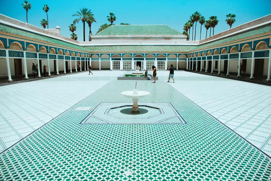 From Casablanca: Day Trip to Marrakech with Camel Ride - Casablanca pickup, the drive with wifi, and a quick Hassan II Mosque pass