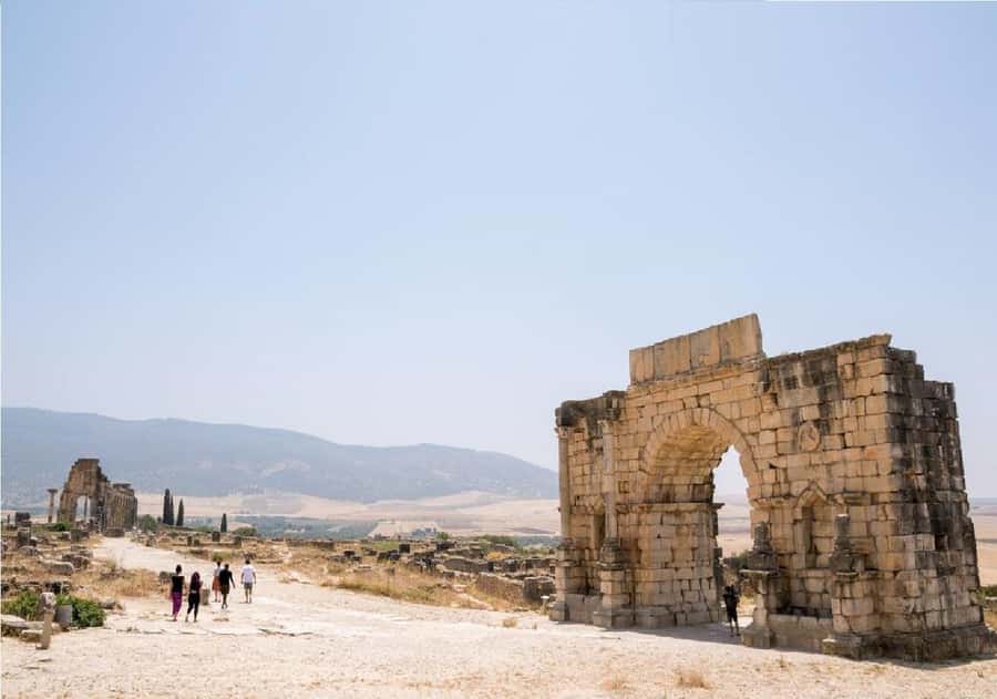 From Fez: Volubilis, Moulay Idriss and Meknes Full Day Tour - A Fast Route Through Roman Ruins, Sacred Streets, and Royal Gates