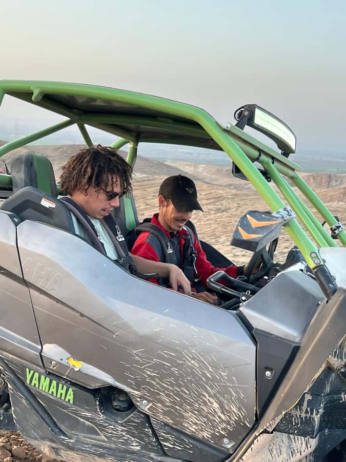 From Marrakech: Agafay Desert Buggy 1Hour & Dinner Show - Getting to the desert: pickup, van time, and a multilingual vibe