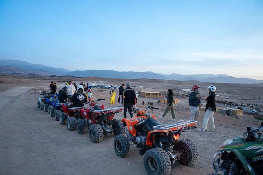 From Marrakech: Agafay Desert Quad Biking with Dinner & Show - Dinner in a nomadic-style tent, with tea and real Moroccan plates