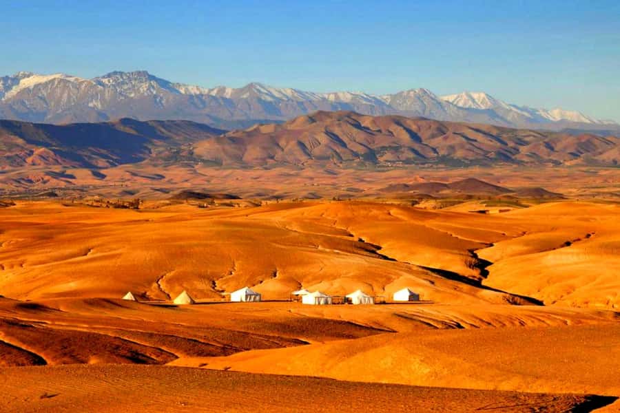 From Marrakech : Agafay Desert Sunset Dinner with Camel Ride - Price and value: $34 for a 4 hour Marrakech desert evening
