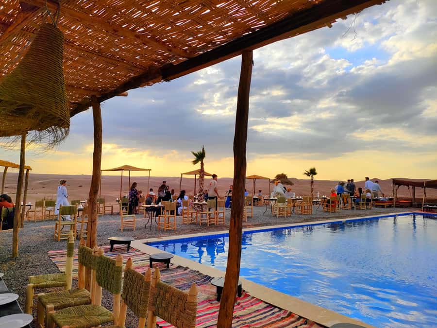 From Marrakech: Agafay Desert Sunset Dinner with Live Show - Quad biking and camel rides: fun options, sometimes extra