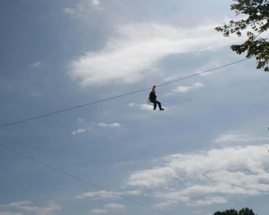 From Marrakech: Atlas Mountains Zip Line Tour Adventure - Zip line safety briefing and the 4-line course over pine forest