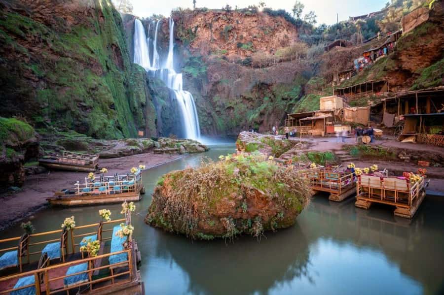 From Marrakech: Guided Ouzoud Waterfalls Tour with Boat Ride - The boat ride under the falls: the closest thing to feeling the power