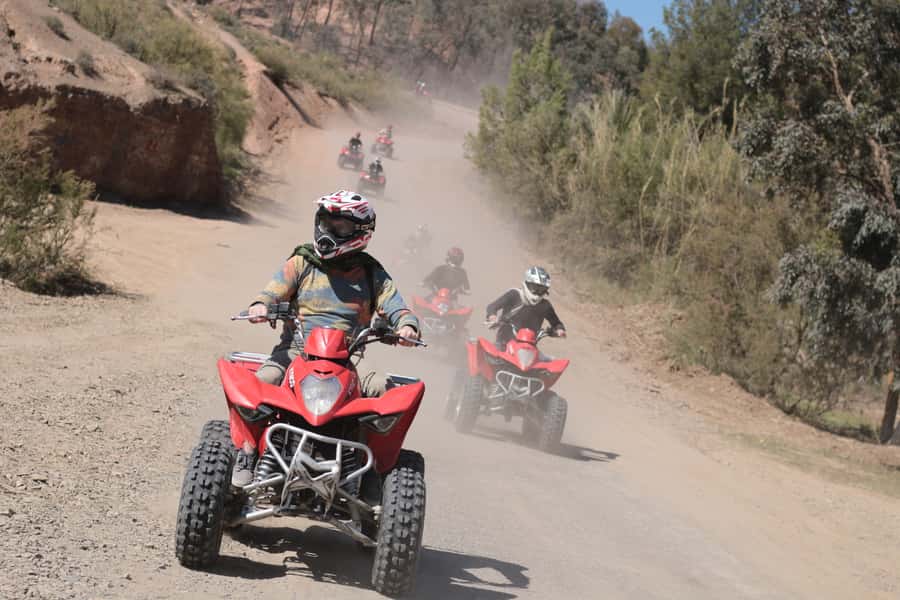 From Marrakech: Guided Quad Biking Tour in Agafay Desert - Mint tea, crêpes, and local pit-stops that break up the dust