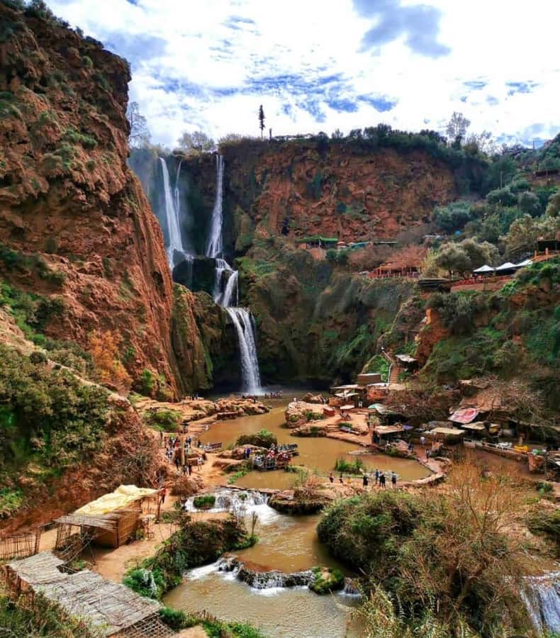 From Marrakech:Ouzoud Waterfalls Day Trip with Boat Tour - The first look en route: olives, red cliffs, and little waypoints