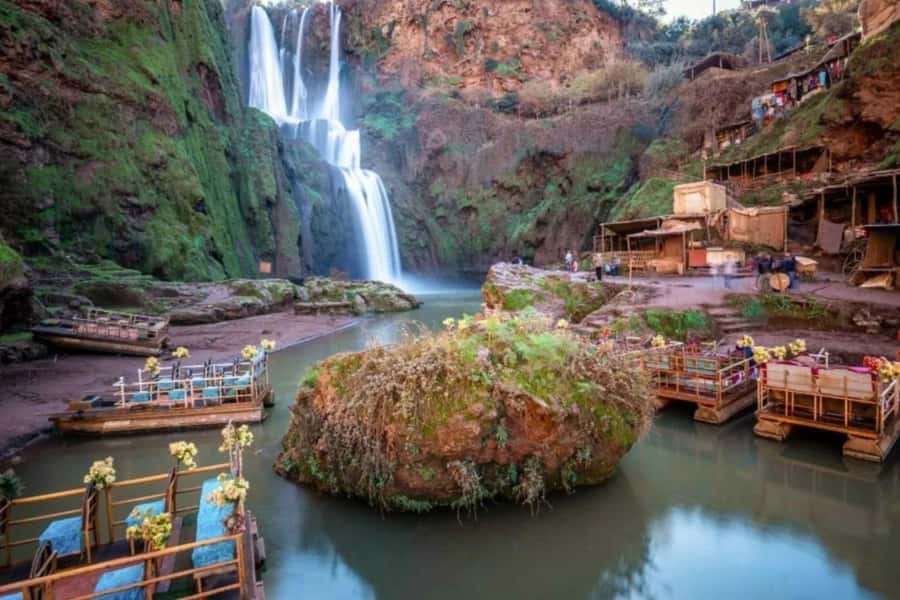 From Marrakech: Ouzoud Waterfalls Guided Hike and Boat Tour - Getting there with Amir and a 17-seat air-conditioned minibus