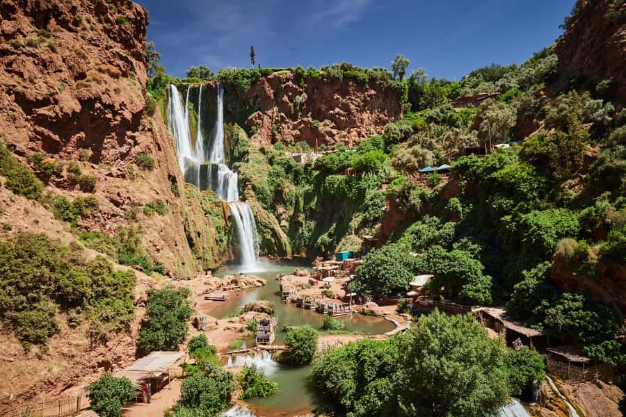 From Marrakech: Ouzoud Waterfalls Guided Tour & Boat Ride - Arriving at Ouzoud: Cascades, Red Rock, and Your First Walk