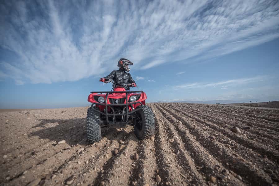 From Marrakech: Premium Agafay Desert Half-Day Quad Biking - The Ride Itself: Oases, Dry Riverbeds, and Controlled Adrenaline