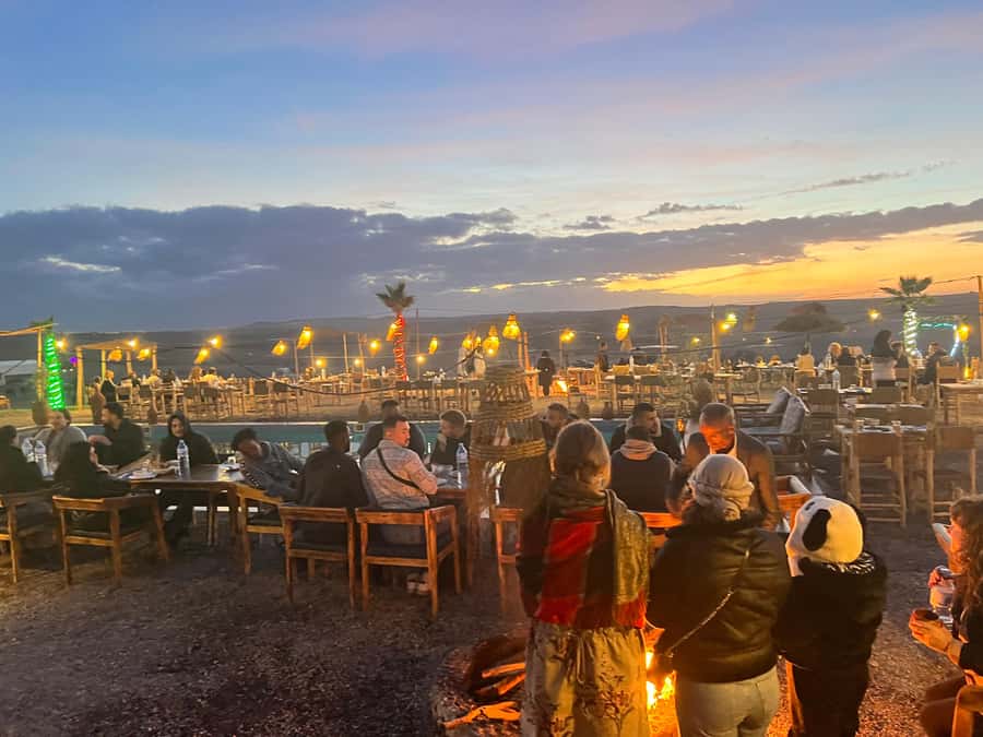 From Marrakech: Sunset Desert Tour with Camel Ride & Dinner - From hotel pickup to argan oil, the cooperative stop