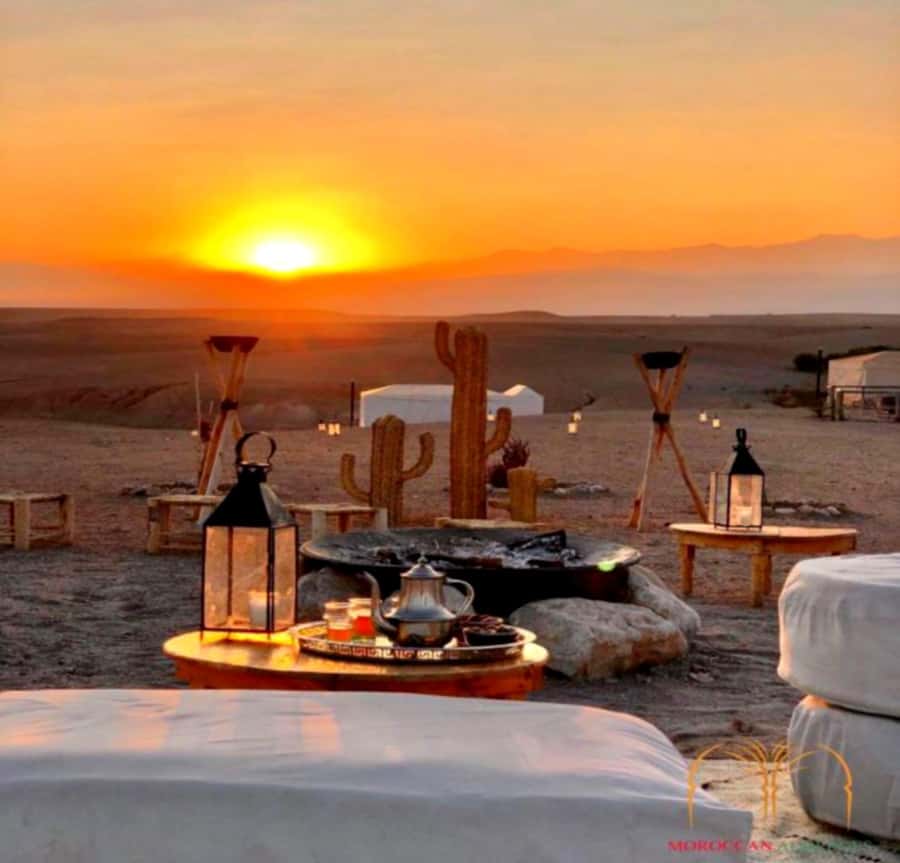From Marrakesh Agafay Desert Dinner & Sunset, and Camel Ride - Berber music around the fire, plus a fire show after dinner