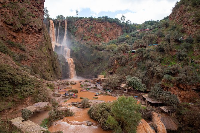 Full Day Trip To Ouzoud Waterfalls From Marrakech & Boat Tour - Ouzoud waterfall time: guided views, steep steps, and photo stops