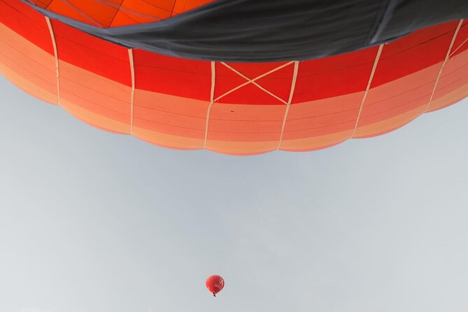 Hot Air Balloon Flight over Marrakech with Traditional Breakfast - The balloons and the views: Atlas Mountains, red dust, and morning color