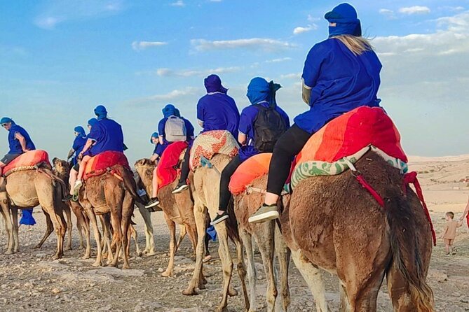 Luxury Agafay Desert : Quad Bike, Camel Ride, Pool & Dinner Show - Camel ride with the blue dress: slower, funnier, and photo-worthy
