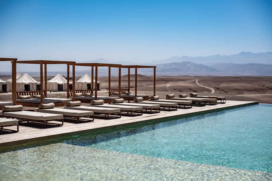 Marrakech: Agafay Desert Inara Camp Pool Day Pass with Lunch - Arriving at Les Terrasses d’Agafay: heated pool, mountain views, and olive-tree shade