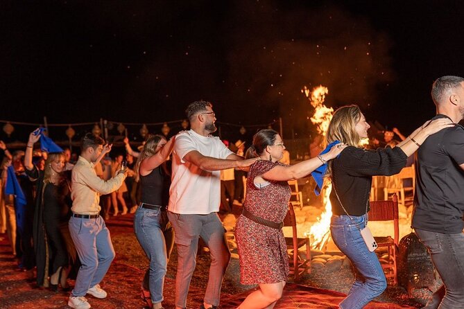 Marrakech Agafay Desert Package Quad Bike&Camel POOL Dinner Show. - Pool swim and the fire celebration: The “camp vibe” shift