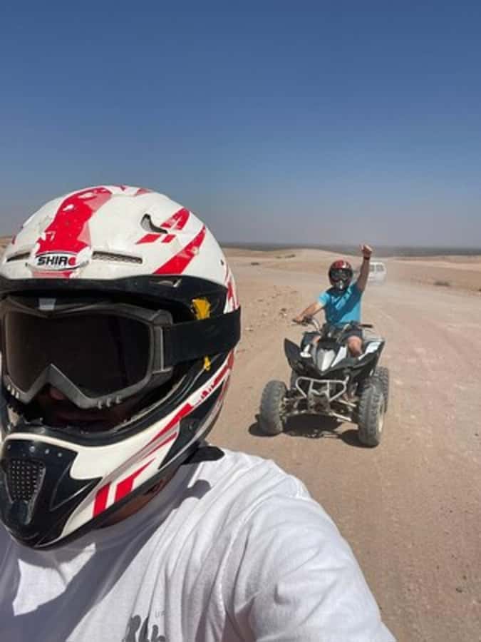 Marrakech: Agafay Desert Quad Biking with Dinner & Show - Berber music, storytelling, and the fire show finale