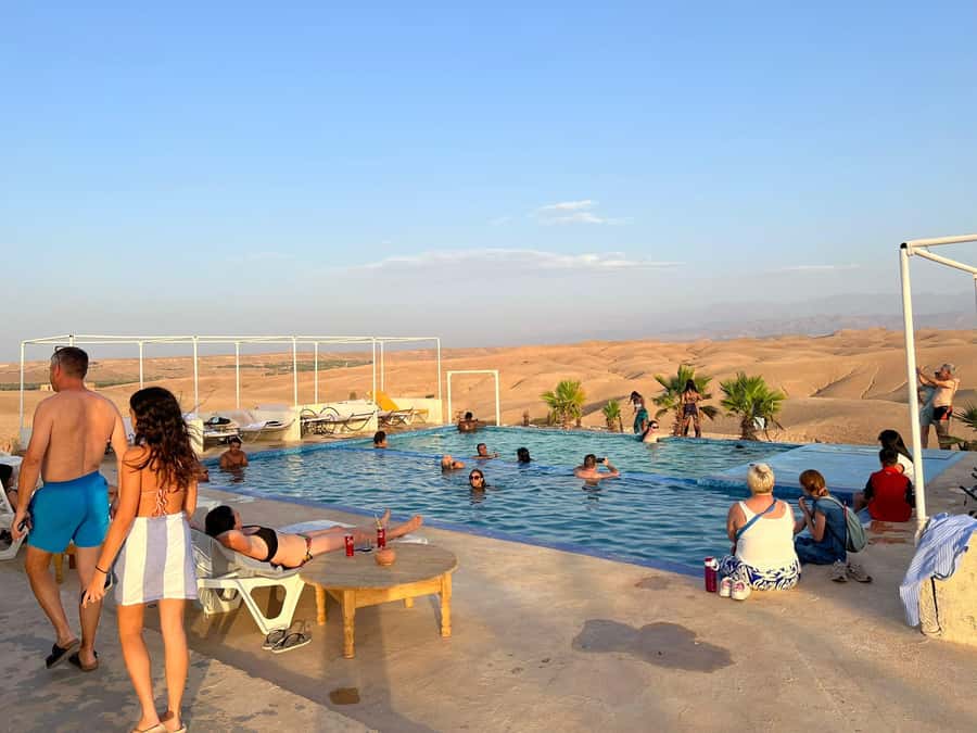 Marrakech: Agafay Desert Quad Camel Rides, Pool, Dinner Show - Getting Picked Up in Central Marrakech (and Why Timing Matters)