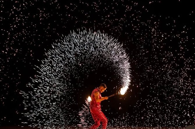 Marrakech: Agafay Desert Sunset, Camel Ride, and Dinner Show - Berber music, campfire energy, and the fire show payoff