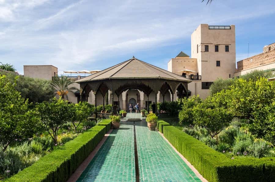 Marrakech: Ben Youssef, Secret Garden, & Souks Walking Tour - Jemaa el-Fnaa: your quick orientation stop before you hit the maze