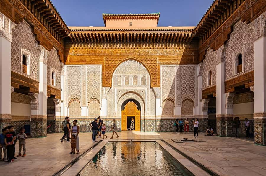 Marrakech: Ben Youssef, Secret Garden, & Souks Walking Tour - Where you start at Café de France, and how the tour keeps you moving