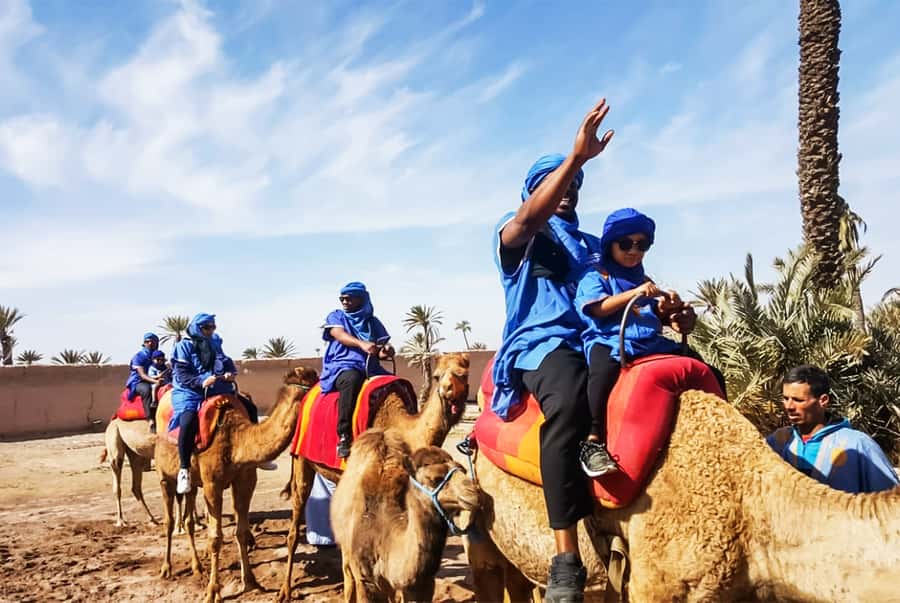 Marrakech: Camel Ride in the Oasis Palmeraie - Traditional clothing, photos, and those little touches that add up