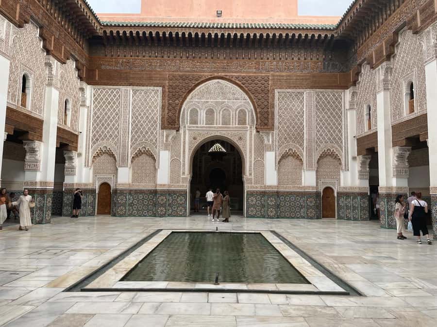 Marrakech: Madrasa Ben Youssef, Secret Garden & Medina Tour - Koutoubia Mosque: landmark energy with a respectful pace