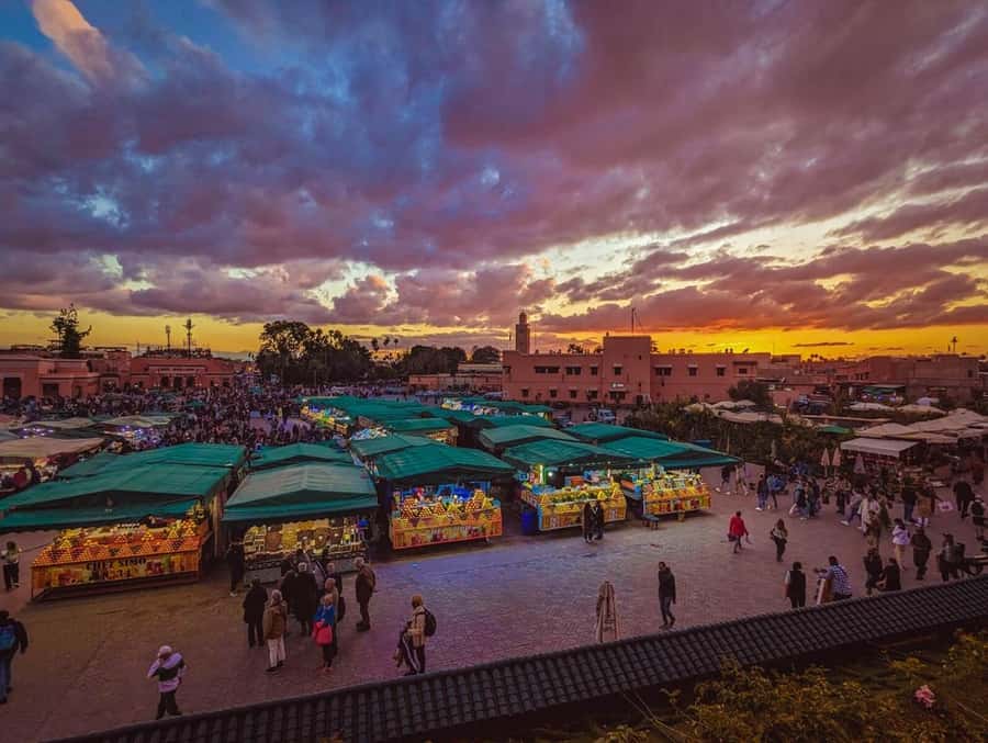 Marrakech: Souk by Night Medina Guided Walking Tour. - Koutoubia Mosque stop: a landmark reset in the middle of the maze