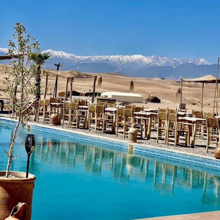 Marrakesh: Agafay Desert Tour with Lunch and Swimming Pool - Berber camp arrival: pool time, shade, and the Atlas Mountain view