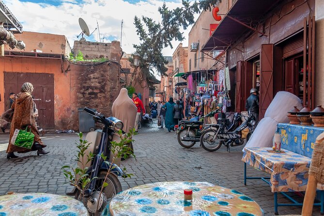 Private Marrakech excursion, camel ride or quad from Casablanca - Mellah and the quiet power of history, plus a quick Majorelle pass